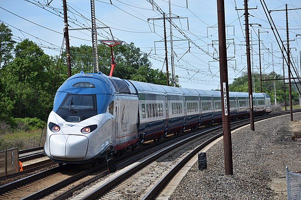 Amtrak Avelia Liberty trainset operating under the 25 Hz traction power system near Claymont, Delaware