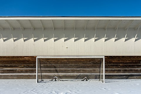 Bleachers and goalpost at Brastad Arena in snow