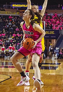 Clark driving to the basket for Iowa