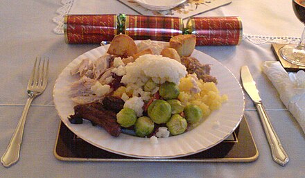 A Christmas dinner plate in Scotland, featuring roast turkey, roast potatoes, mashed potatoes and brussels sprouts