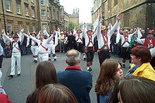 Morris dancing on May Day in Oxford, England, in 2004. Cotswold Morris handkerchiefs 20040501.jpg