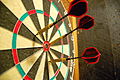 Darts in a bullseye target