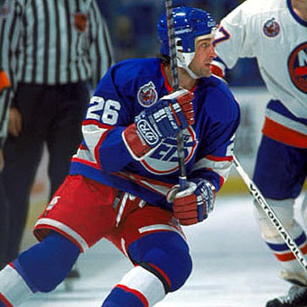 Dean Kennedy playing for the original Winnipeg Jets. The team was founded in 1972, joined the NHL in 1979, and moved to Phoenix in 1996.