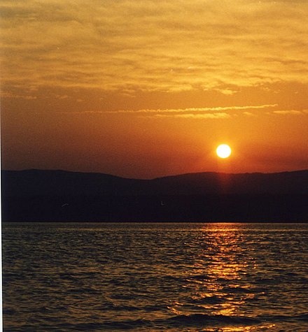 The sun sets over Deer Lake