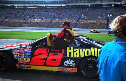 Irvan entering his car at Charlotte Motor Speedway in 1996.