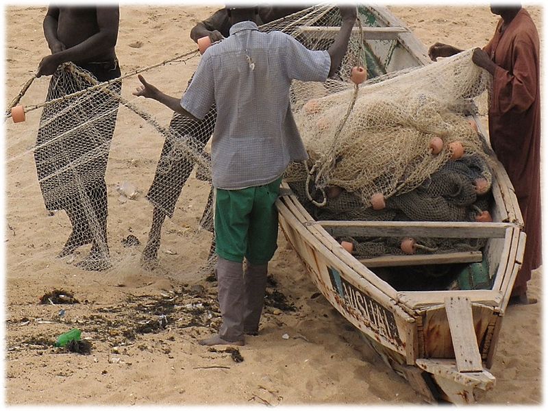 File:FISHERMEN STOWING NET.jpg