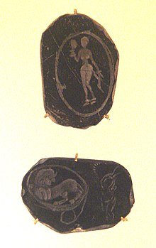 Grey pottery with engravings, Arikamedu, 1st century CE. GreyPotteryWithEngravingsVirampatnamArikamedu1stCenturyCE.jpg