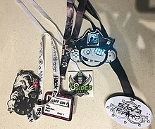 A variety of electronic and non-electronic hacker conference badges HackerCon Badges.jpg