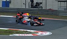 Lewis Hamilton racing against Sebastian Vettel at the Chinese Grand Prix Hamilton vettel china 2012 cropped.jpg