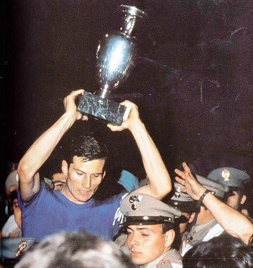 Captain Giacinto Facchetti celebrates Italy's UEFA Euro 1968 victory.