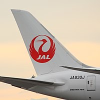 The tsurumaru logo on a Japan Airlines Boeing 787. JAL Dreamliner tail (15062685180).jpg