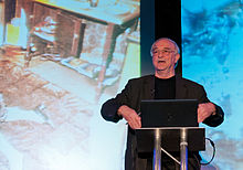 Joe Nickell at QED Con 2012 with photo of alleged Spontaneous Human Combustion JoeNickellAtQEDcon2012-6.jpg