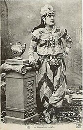 A 19th-century photograph of a Kocek, a cross-dressing young slave boy sometimes used for homosexual purposes Kuchek Hanem - 19th century dancer 01.jpg