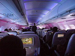 'n Virgin America Airbus A320 "Enhanced" ekonomiese klas met LED-kajuitbeligting.