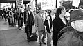 Marchers prepare to cross Powell street once more to hear speakers