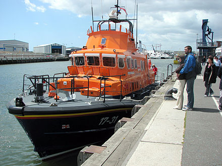 Foredeck of Severn-class lifeboat No. 17–31 at quay in Poole Harbour, Dorset, England.