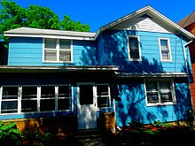 Gullah Geechee people in the Sea Islands paint their houses blue to ward off evil spirits. Light Blue House - panoramio.jpg