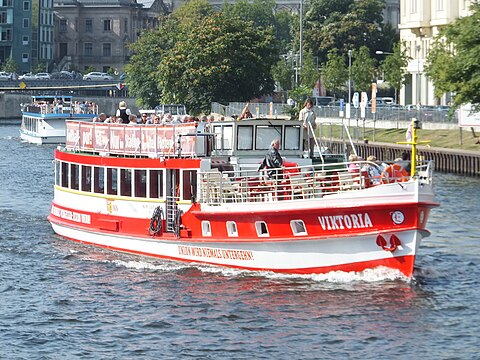 Union Berlin boat on the river Spree