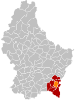 Комуна Бус (помаранчевий), кантон Реміх (темно-червоний) та округ Гревенмахер (темно-сірий) на карті Люксембургу