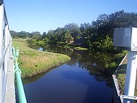 Section of McKay Creek just south of 8th (Taylor) Avenue SW. McKay Creek pmr 01.jpg