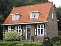 This is an image of rijksmonument number 478472 A house at Meidoornlaan 36, Veenhuizen.