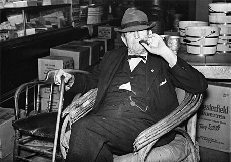 Mr. R. B. Whitley visiting in his general store, Wendell. Wake County, North Carolina, September 1939