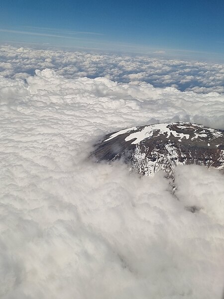 File:Mt. Kilimanjaro peaking through the clouds.jpg