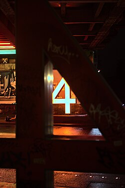 Neon sign under railway bridge no. 4 in Bochum, Germany