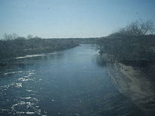 The Passaic River borders Garfield, New Jersey to the west. The groundwater contamination flows towards the river, located approximately 2,500 feet away from the E.C Electroplating facility. Passaic River in Bergen and Passaic County.jpg