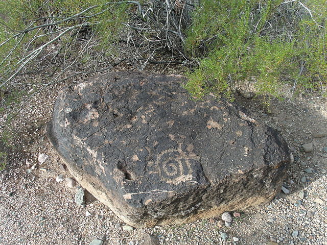 A petroglyph with a spiral carved into it