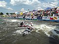 The C-2 team final. The first two Slovakian boats pass gate #12.