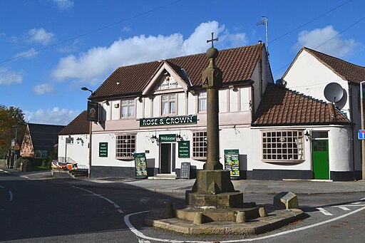 Pub and village cross in Barlborough
