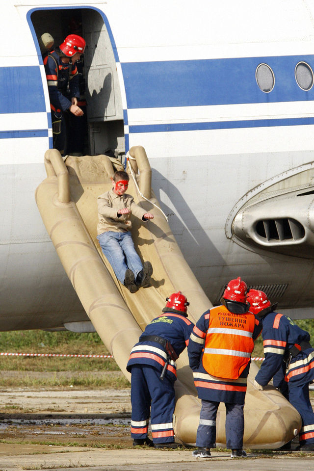 What does 'arm doors and cross check' mean on a plane?