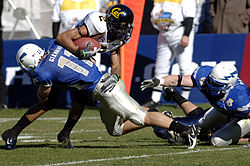 On offense during the 2007 Armed Forces Bowl. Robert Jordan gets tackled AFB 071231-F-0558K-015.JPEG