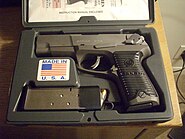 Ruger P-90 in original box with extra magazine and speed loader.