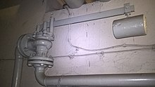 Lever arm safety valve in district heating substation before the renovation. Budapest Sulyterhelesu biztonsagi szelep.jpg