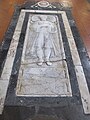 Tombstone at the center of the nave