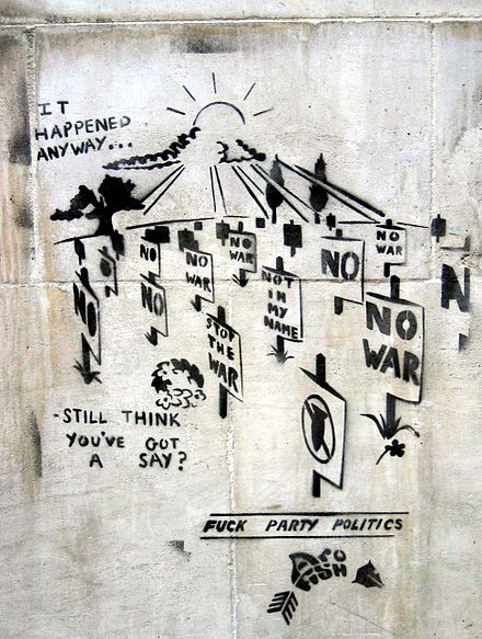 Political Graffiti on the South Bank of the Thames in London 2005, "even though we lack personal acquaintance with all but a few of its participants and are seldom in contexts where we and they directly interact, we join these exchanges because they are discussing the same matters".[46]