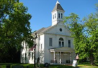 The Second Arenac County Courthouse is listed on the National Register of Historic Places and is now home to the Arenac County Historical Society. Second Arenac County Courthouse - Omer Michigan.jpg