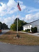 Solar powered light shining on U.S. flag