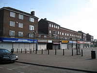 The main shopping precinct in South Oxhey town centre South Oxhey, St Andrew's Road shops - geograph.org.uk - 1375008.jpg