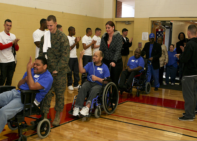 File:Special Olympics athletes enter the base gym to begin the 2011 Onslow County fall games Dec 111202-M-JO751-006.jpg