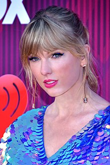 Taylor Swift arriving at the iHeartRadio Music Awards Show in March 2019