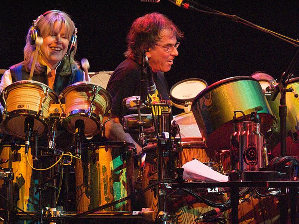 Tipper Gore and Mickey Hart playing drums together during a The Dead concert in April 2009