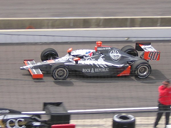 Townsend Bell driving the No. 90 Rock & Republic Vision Racing Dallara/Honda/Firestone entry during practice for the 90th running of the Indianapolis 