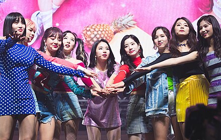 South Korean idol girl group Twice. Left to right: Momo, Jeongyeon, Jihyo, Nayeon, Chaeyoung, Dahyun, Mina, Tzuyu and Sana.