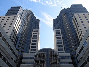 Exterior courtyard of 1988 commercial building and residence towers, view southeast towards Howard Street