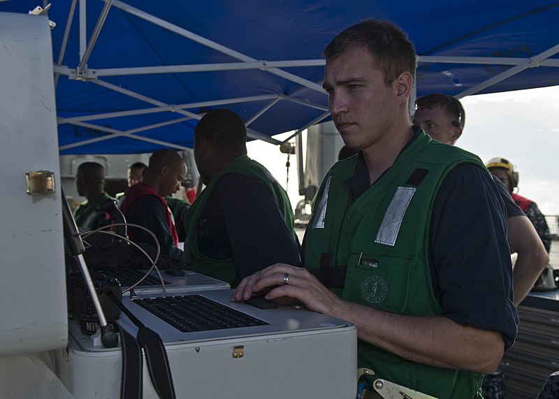 File:U.S. Navy Aviation Electrician's Mate 2nd Class Raymond Serman, assigned to the targets detachment at Fleet Activities Okinawa, Japan, operates the system for naval target control on the flight deck of 130525-N-IY633-065.jpg