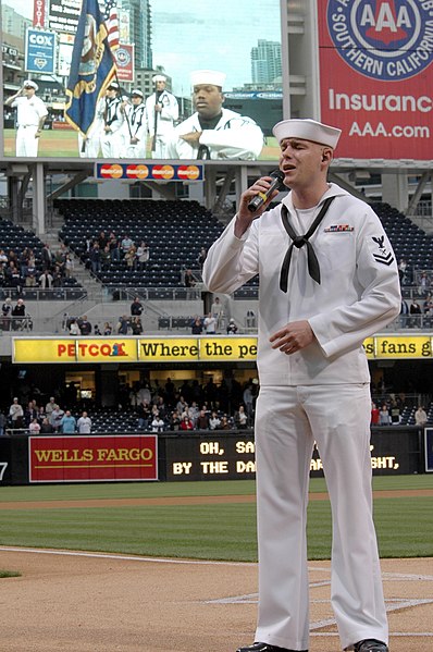 File:US Navy 070501-N-1635S-001 Standing in front of a crowd of over 19,000 people, Intelligence Specialist 2nd Class Jarrod Fowler from San Bernardino, Calif., sings the national anthem prior to a San Diego Padres game in Petco Par.jpg