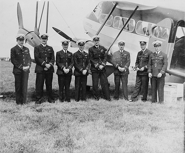 The pilots beside Karoro at Milson in January 1936